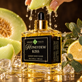 Honeydew juice dripping over the Honeydew Kiss Luxury Body Elixir bottle